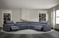 Blue grey J & M Furniture Picasso motion sectional sofa with plush cushions and modern design.