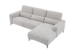 Light gray J & M Furniture Winslow fabric sectional with a chaise, showcasing plush cushions and contemporary design.
