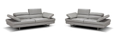 J & M Furniture Aurora Stationary Sofa in a neutral fabric with plush cushions and sleek armrests, perfect for modern living rooms.