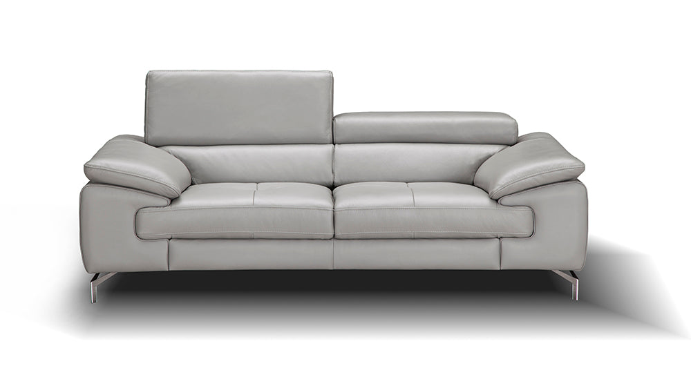 J & M Furniture Liam stationary sofa with plush upholstery and modern design, shown in a living room setting.