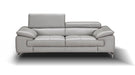 J & M Furniture Liam stationary sofa with plush upholstery and modern design, shown in a living room setting.