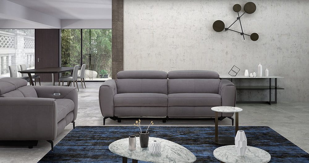 Grey J & M Furniture Lorenzo stationary sofa with plush cushions and modern design, perfect for living room comfort.