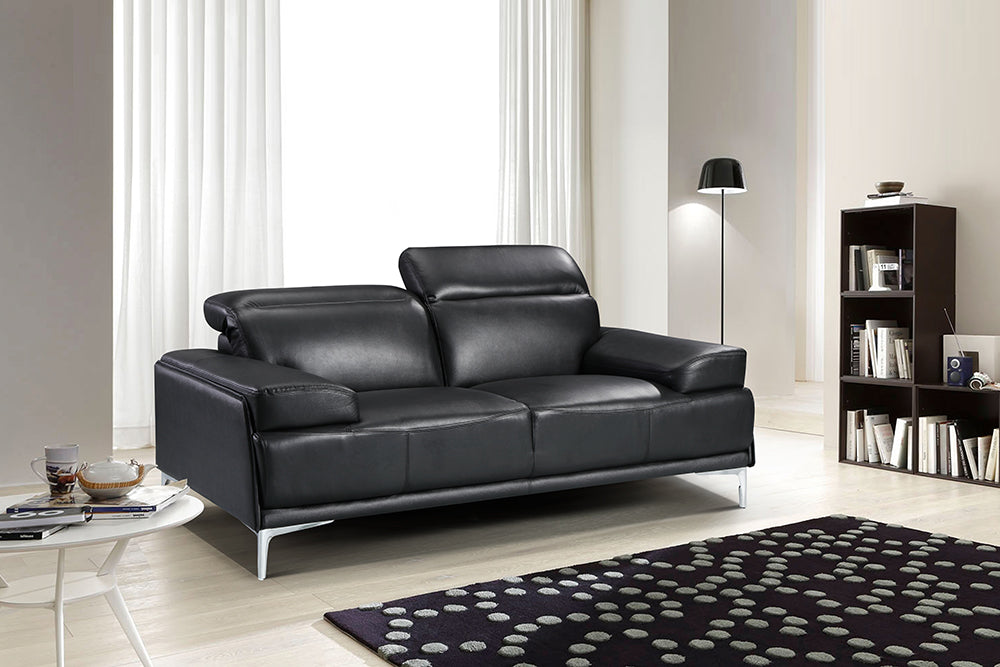 Black J & M Furniture Nicolo stationary sofa with plush cushions and modern design, perfect for living room seating.
