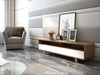 J & M Furniture Gramercy TV base with sleek wooden finish and open shelving for media devices and accessories.