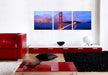J & M Furniture wall decor featuring a Golden Gate Bridge artwork, showcasing a scenic cityscape in vibrant colors.