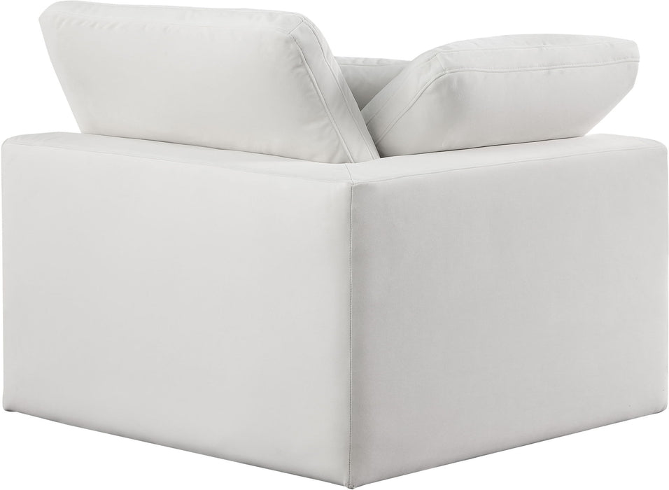 Velvet corner chair by Meridian Furniture, showcasing plush upholstery and modern design for comfortable corner seating.