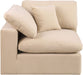 Velvet corner chair from Meridian Furniture in a cozy, modern design, showcasing its plush fabric and stylish corner style.