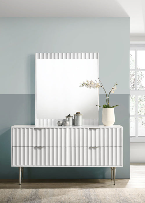 Modernist dresser by Meridian Furniture featuring sleek wood finish and minimalist design with multiple drawers for storage.