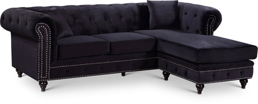 Meridian Furniture Sabrina reversible sectional sofa with plush cushions and modern design, shown in a cozy living room setting.