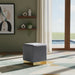 Meridian Furniture Jax stool ottoman with gold base, upholstered cushioned seat, modern design, and sleek metallic finish.
