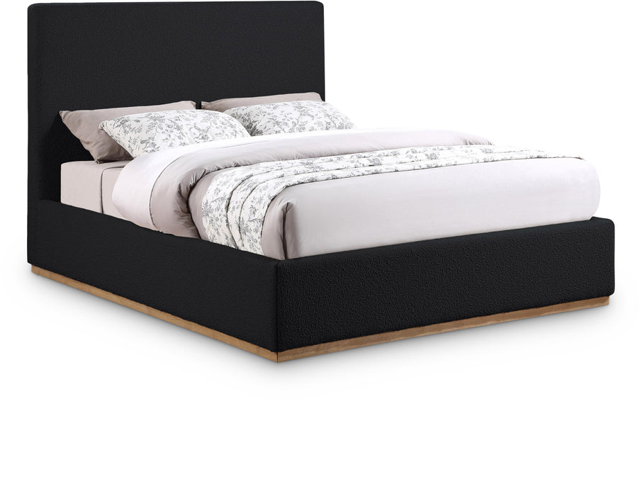 Upholstered Monaco bed by Meridian Furniture with a modern design, featuring a padded headboard and neutral fabric upholstery.