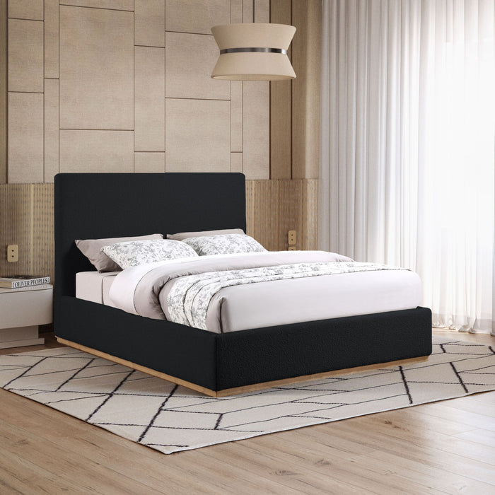 Meridian Furniture Monaco upholstered bed with a modern design, featuring a padded headboard and neutral fabric upholstery.