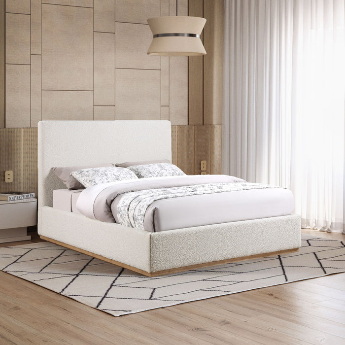 Upholstered Monaco bed by Meridian Furniture with a padded headboard and neutral fabric, showcasing a modern bedroom design.