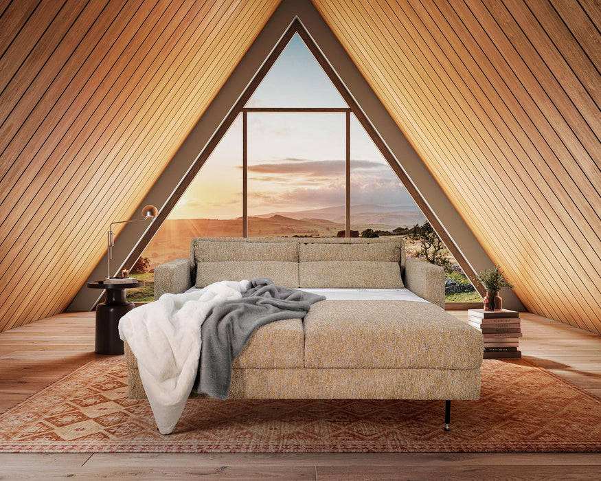 Omnia Leather Slofa The Bliss sectional sleeper sofa with storage chaise on the right, featuring plush cushions and modern design.