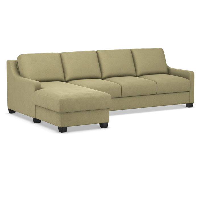 Omnia Leather Slofa The Joy sectional sleeper sofa with storage chaise on the left, featuring plush cushions and modern design.