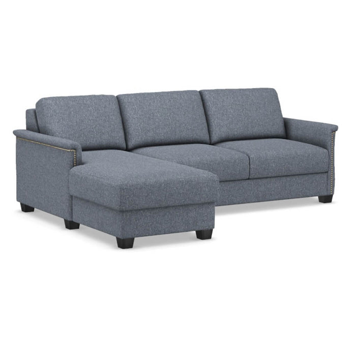 Omnia Leather Slofa The Retreat sectional sleeper sofa with storage chaise on the left, featuring plush upholstery and modern design.