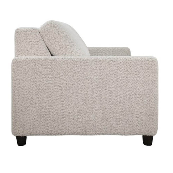 Omnia Leather Slofa Karma sleeper sofa with gray upholstery and modern design, featuring a folded-out bed in a living room setting.
