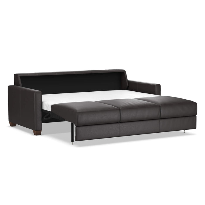 Omnia Leather Slofa Karma sleeper sofa in gray fabric with wooden legs, showing its open bed and modern design.