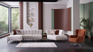 Bellona Atlanta sectional sofa with plush cushions and modern design, shown in a spacious living room setting.