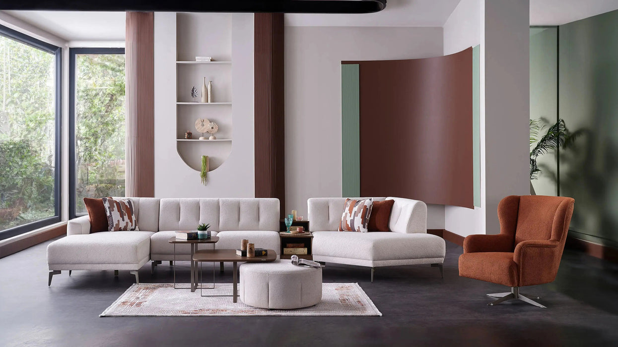 Bellona Atlanta sectional sofa with plush cushions and modern design, shown in a spacious living room setting.