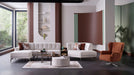 Bellona Atlanta sectional sofa with plush cushions and modern design, shown in a spacious living room setting.