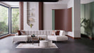 Bellona Atlanta sectional sofa with plush cushions and modern design, featuring neutral fabric upholstery and multiple seating sections.