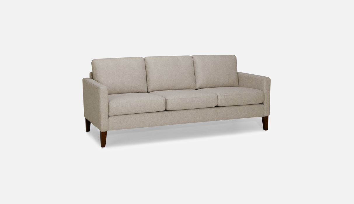 Palliser Furniture Soren sofa in fabric or leather with plush cushions, shown in a stylish living room setting.