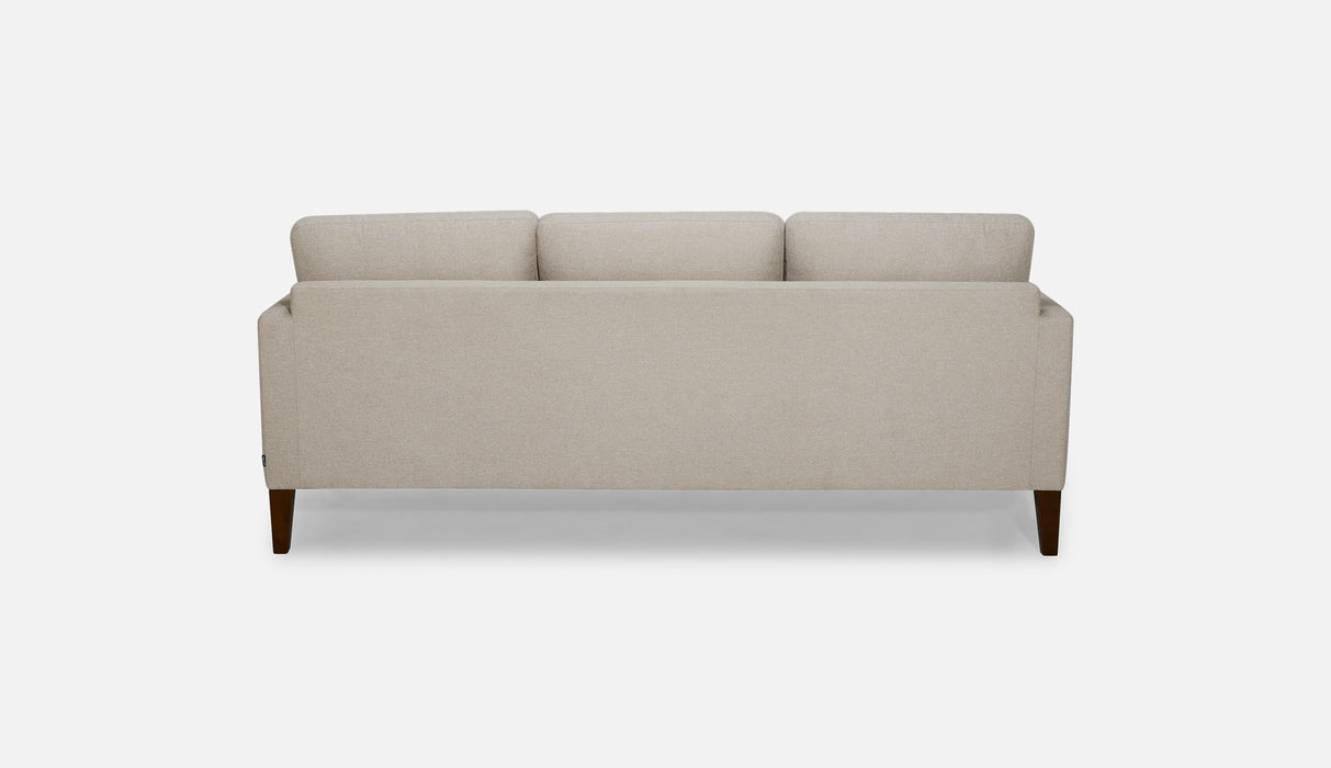 Palliser Furniture Soren sofa in fabric and leather, showcasing plush cushions and modern design in a living room setting.