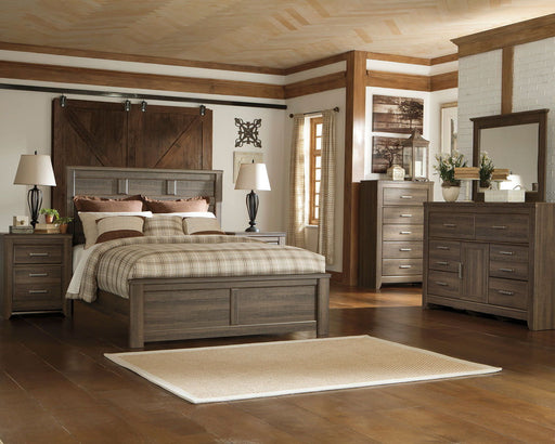 Signature Design by Ashley Juararo 6-piece panel bedroom set featuring a bed, dresser, and matching nightstands in a modern style.