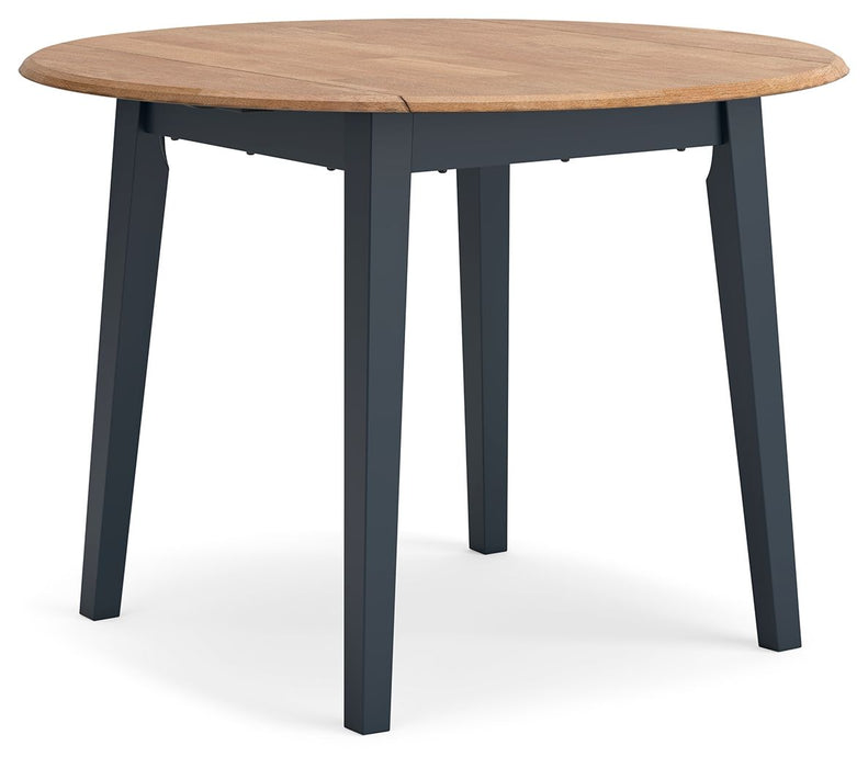 Round wooden dining table from Signature Design by Ashley, with drop leaf sides, ideal for dining rooms and casual gatherings.